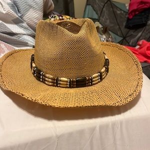 Tan hat with beads wrapped around